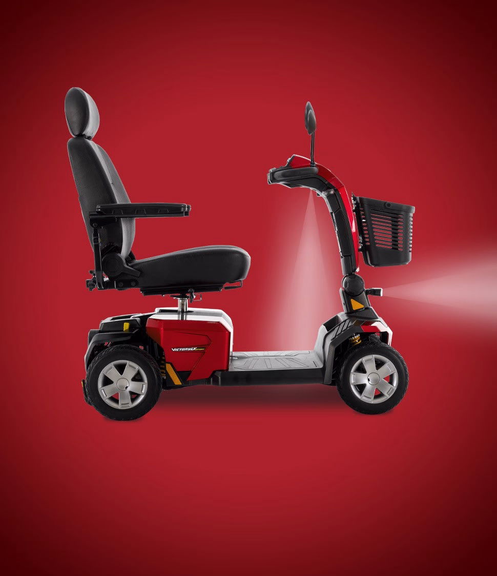 Pride Victory LX Sport 4-Wheel Candy Apple Red side profile with LED lighting